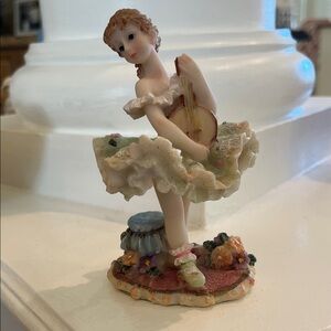 Porcelain Ballerina Figurine with Floral Accents and Banjo